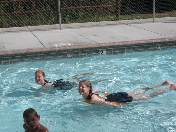 Conner, Shauna, and Connie swimming.